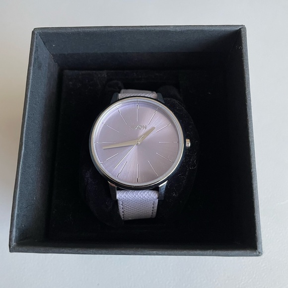 Nixon women’s Kensington watch with a lavender leather band. Brand new with box.
